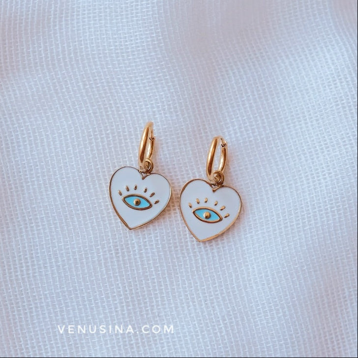 Pendientes "ojito" blanco