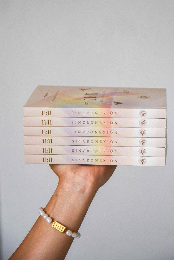 Libro Sincronexión 11:11 en español — guía para comprender la sincronicidad y los mensajes del Universo. Venusina.